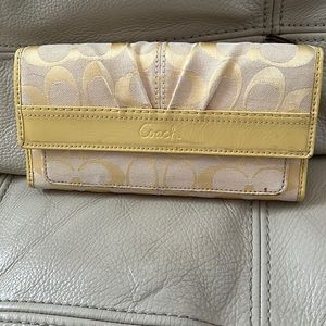 Trifold with leather trim/See photos for more details on condition.